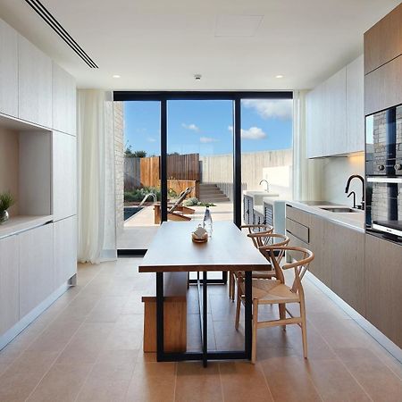 Minthis Resort Tsadha Exteriör bild A kitchen in a typical apartment
