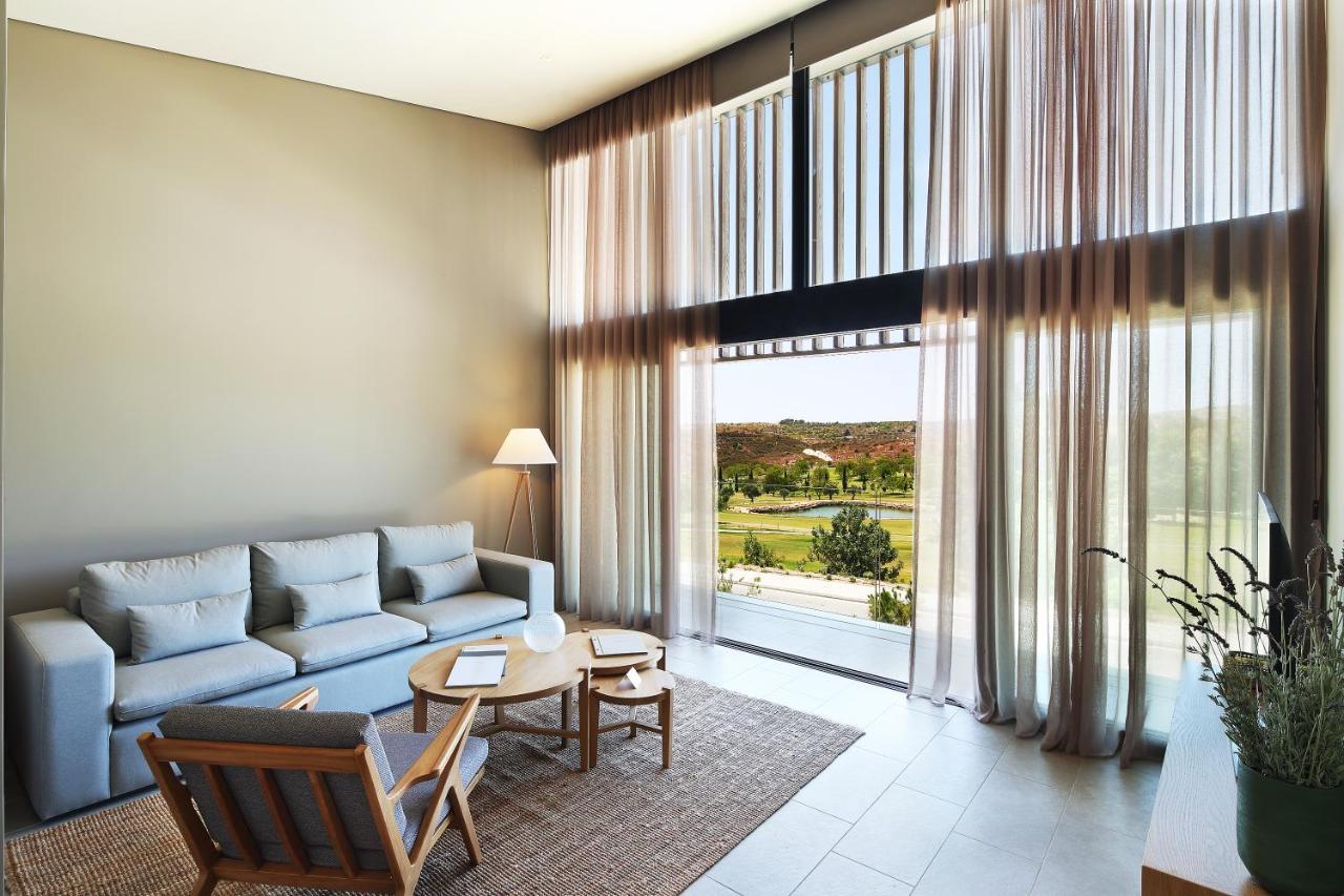 Minthis Resort Tsadha Exteriör bild Interior of a villa at the resort