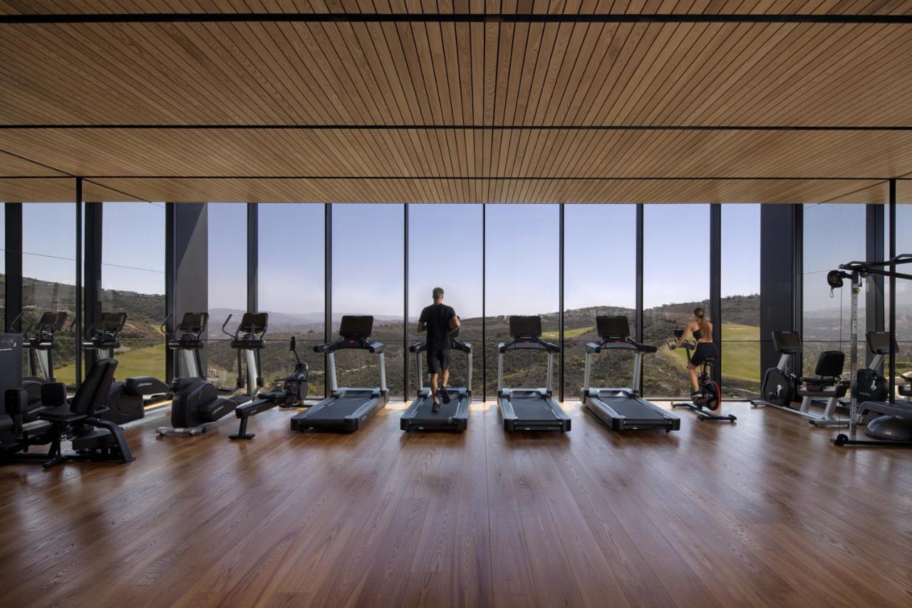 Minthis Resort Tsadha Exteriör bild The gym at the hotel