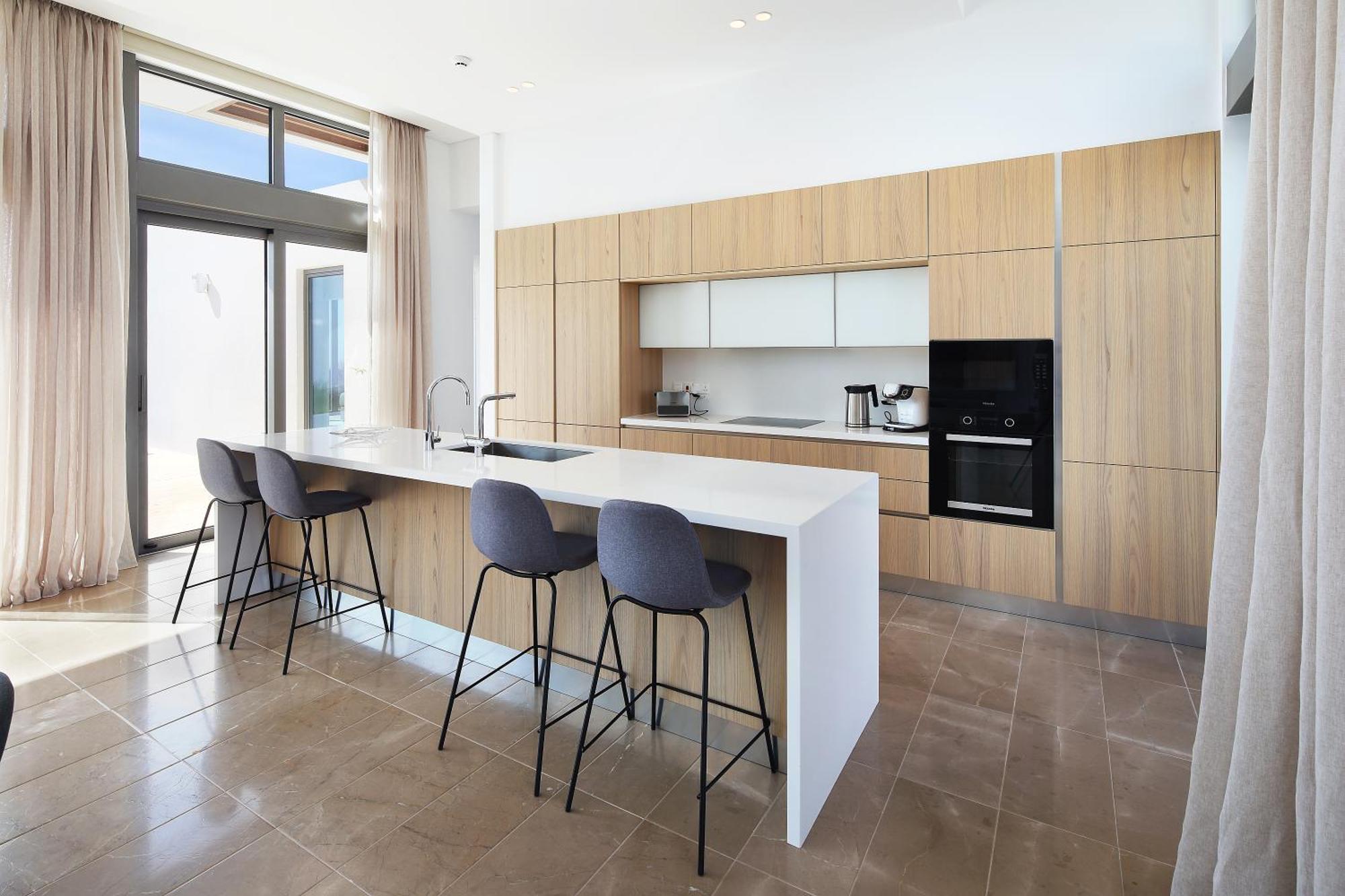 Minthis Resort Tsadha Exteriör bild A kitchen